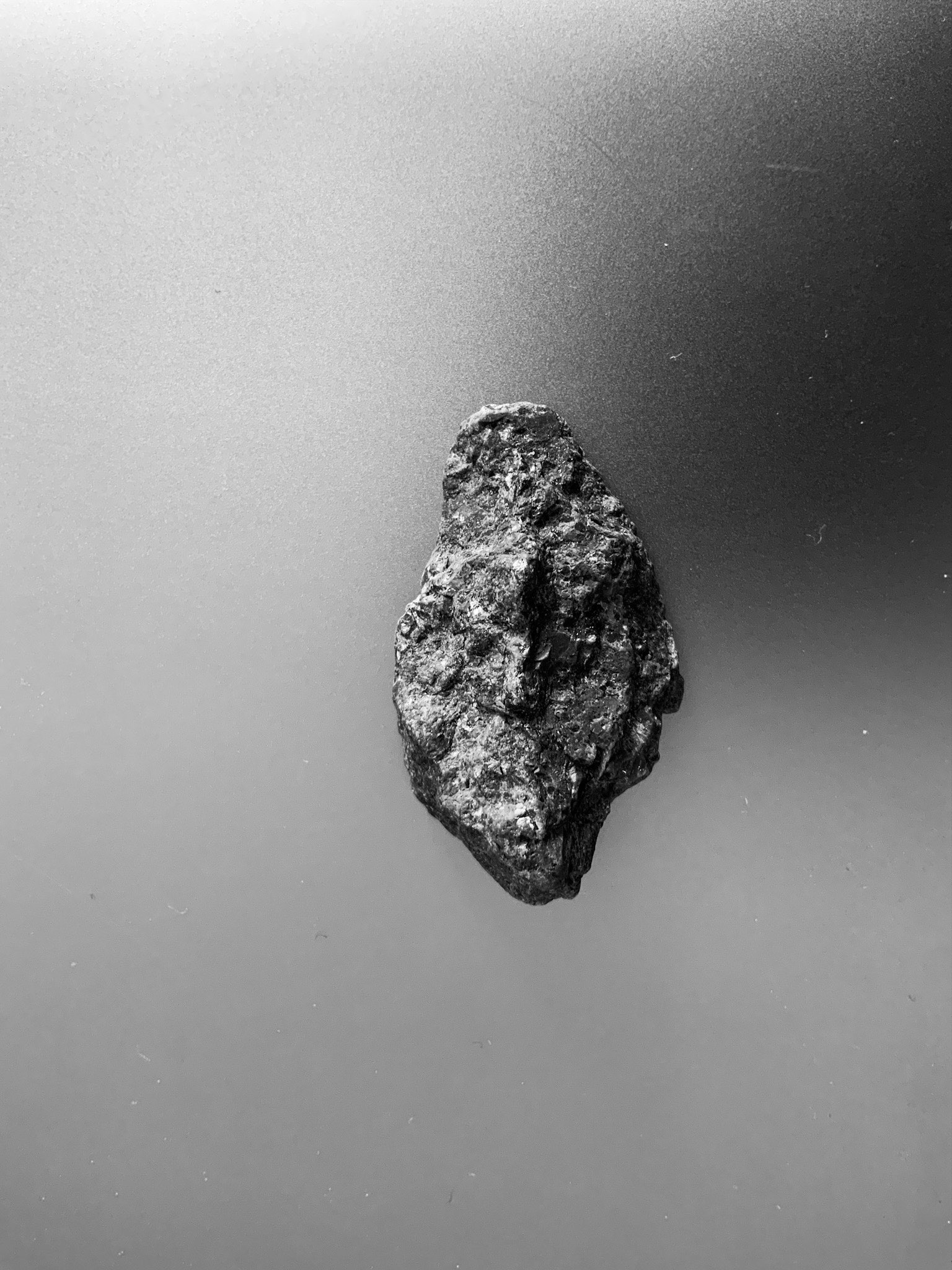 Black and white image of a stone